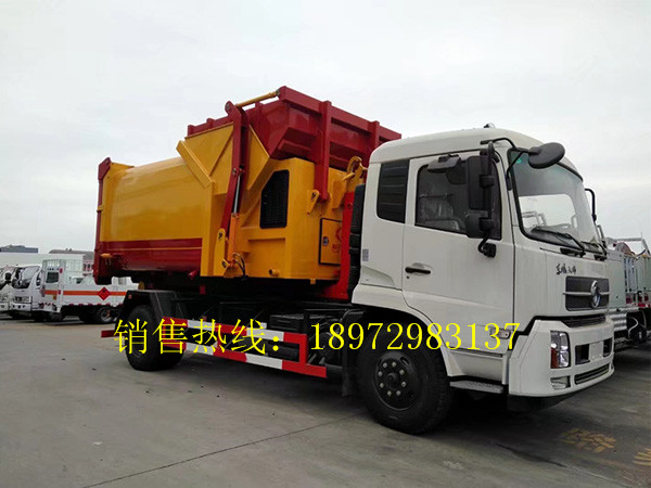 东风天锦勾臂式带移动压缩箱钩臂车